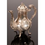 A 19th Century French silver coffee pot, Henin & Cie, the cover with leaf finial,