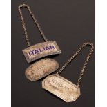 A silver wine label named 'Italian' in blue enamel, Birmingham 1949, and two other wine labels,