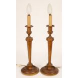 A pair of table lamps of Neoclassical column form,