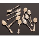 A set of six silver teaspoons, Sheffield 1888, with shell bowls and five silver coffee spoons,
