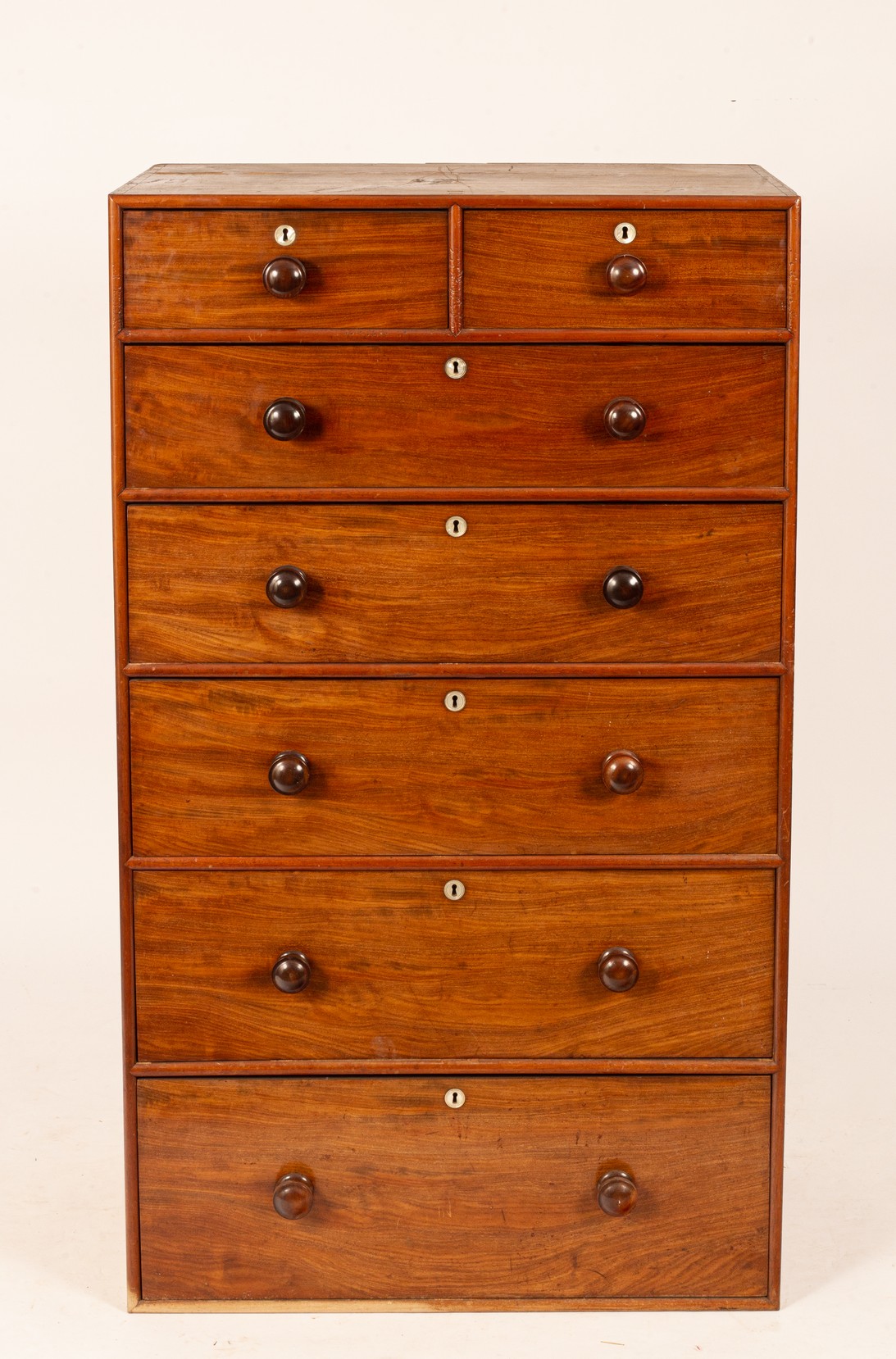 A William IV mahogany chest of drawers, circa 1835, with two short and five long graduating drawers,