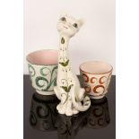 An Italian ceramic cat, circa 1960s, of tall proportions and decorated green floral details, 35.