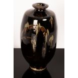 Jim Malone (born 1946), a stoneware vase, footed ovoid vessel with flared lip, tenmoku glaze,