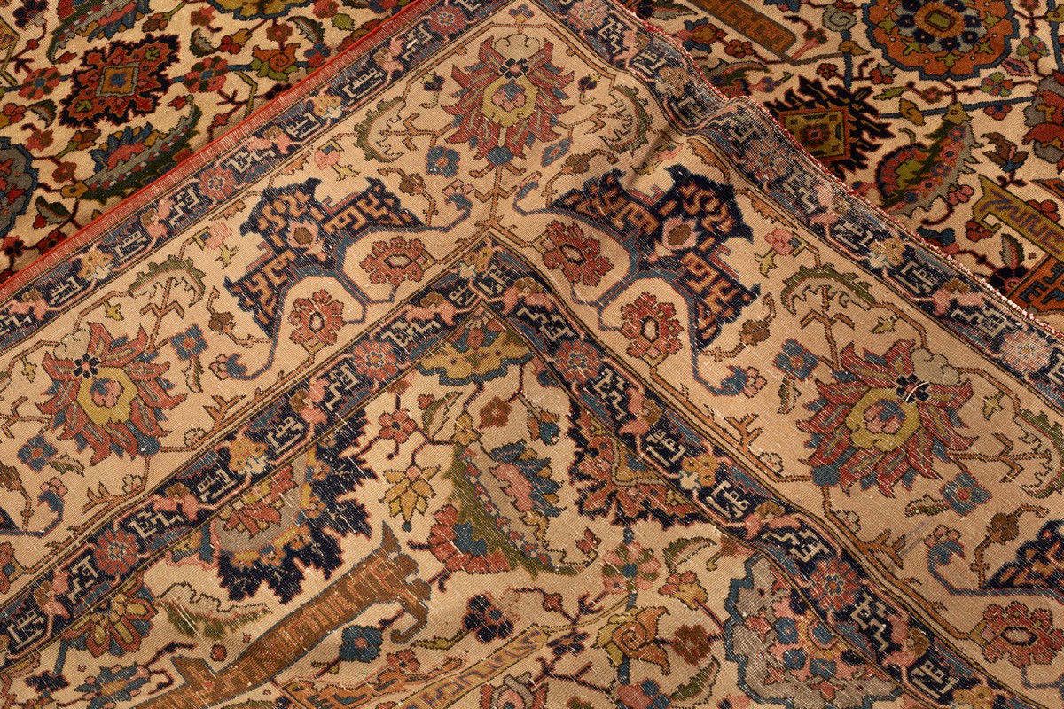 A fine Tabriz carpet, North West Persia, circa 1940, the ivory field of leafy vines, flowerheads, - Image 6 of 6