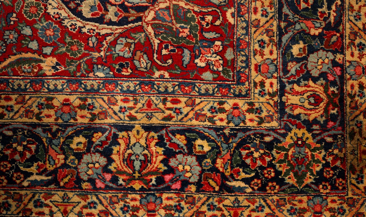 A Tabriz carpet, North West Persia, the madder field with an indigo medallion, - Image 3 of 11