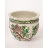 A Chinese famille rose bowl, Juangang, Guangxu, decorated with a phoenix on a rock among peonies,
