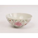 A Chinese famille rose porcelain bowl, 19th Century, decorated with peonies, lilies and butterflies,