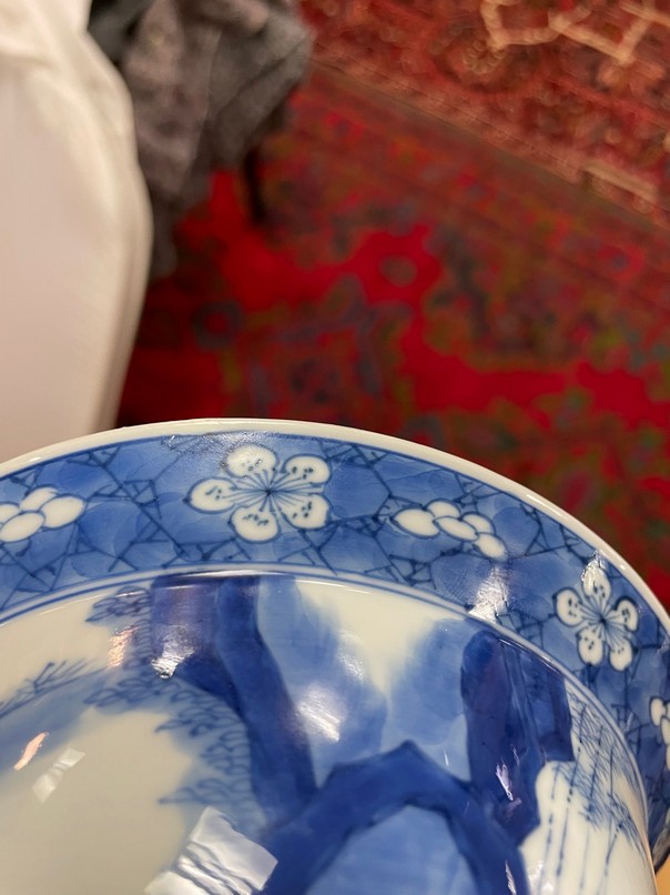 A Chinese blue and white porcelain bowl, Kangxi, depicting ladies and a boy playing in the garden, - Image 7 of 10