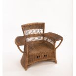 A child's rattan armchair by Dryad,