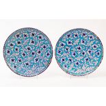 A pair of Iznik style pottery chargers, 19th Century,