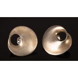 A pair of Georg Jensen style silver earnings of organic form, stamped 925 verso, 24mm diameter,