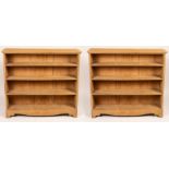 A near pair of oak open bookcases,