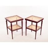 Ceraudo, a pair of lacquer bedside tables of pomegranate colour, with cane top and under-tier,