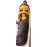 A Chinese wooden carving, 19th/20th Century, depicting a long bearded Taoist priest,