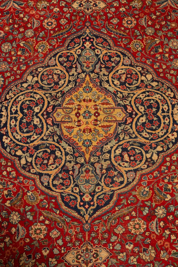 A Tabriz carpet, North West Persia, the madder field with an indigo medallion, - Image 5 of 11