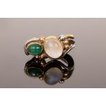 A silver ring by Barbara Bertagnolli with cabochon set oval moonstone and tourmaline,