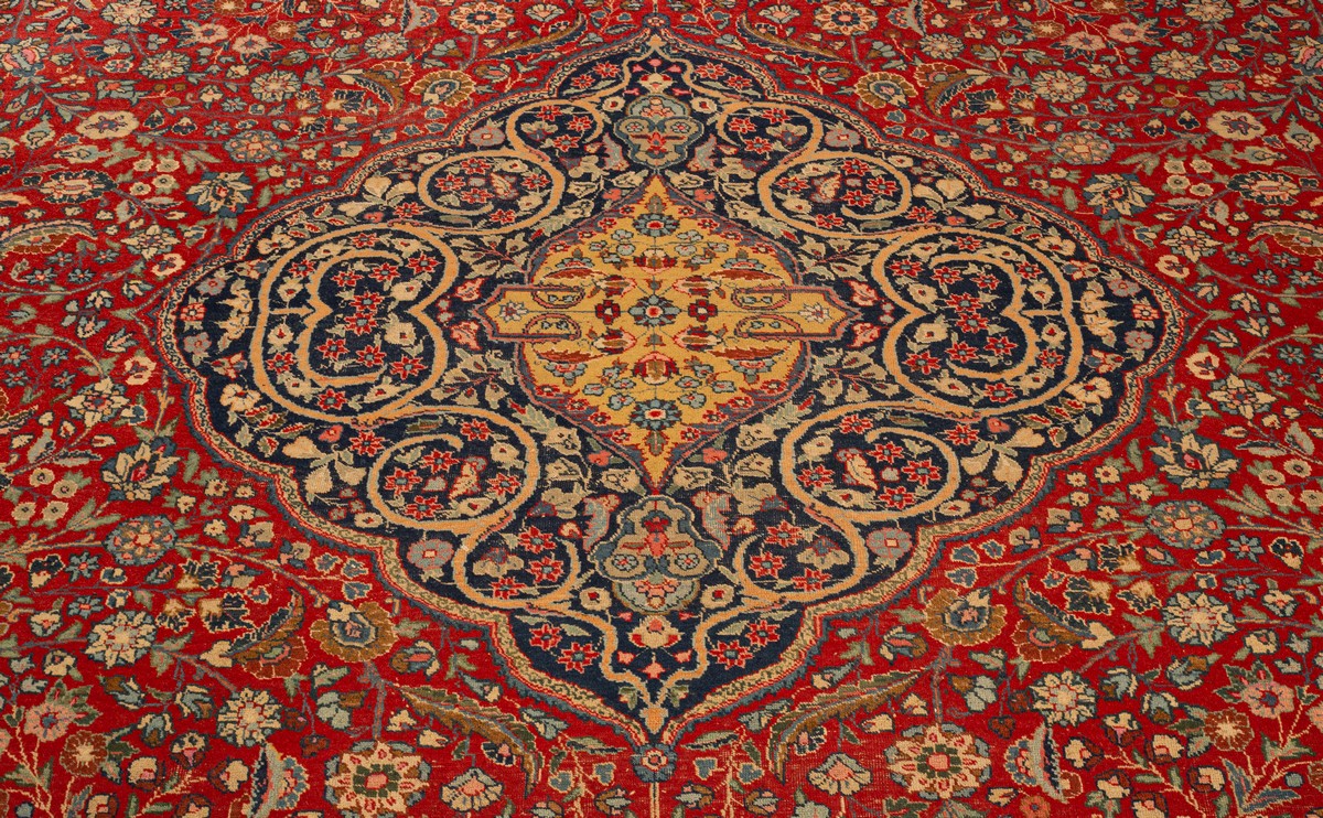 A Tabriz carpet, North West Persia, the madder field with an indigo medallion, - Image 6 of 11