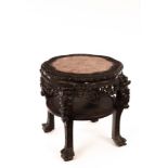 A Chinese hardwood carved stool , 20th Century, with marble top, 58cm high,