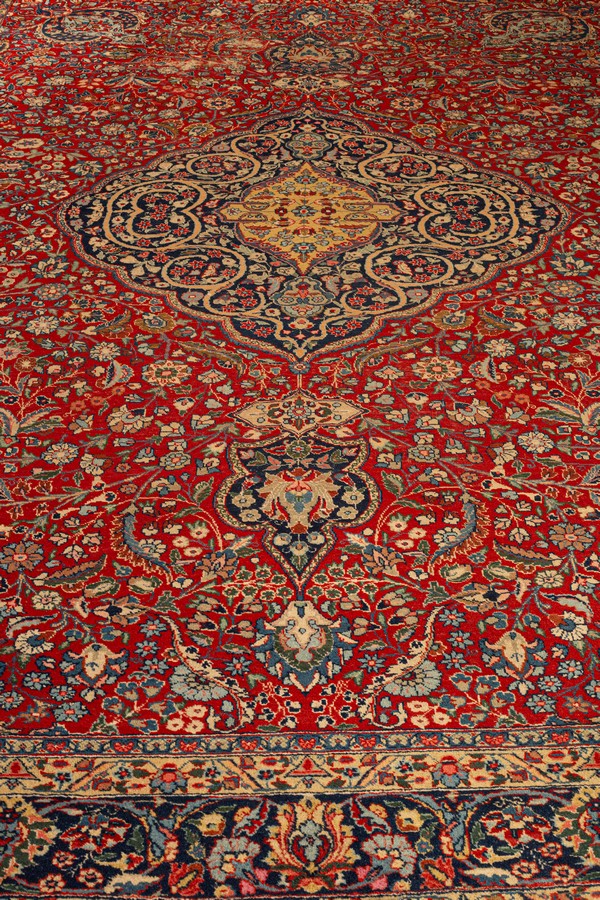 A Tabriz carpet, North West Persia, the madder field with an indigo medallion, - Image 2 of 11