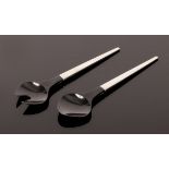 Henning Koppel for Georg Jensen, a pair of Caravel salad servers, designed 1957,