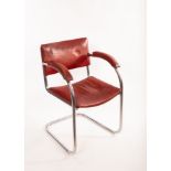 A Pel chrome framed desk chair, the bent frame with upholstered back,