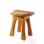 David Lightly for the Tim Stead Studio, an elm stool with dished and shaped seat on four legs,