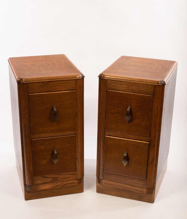 A pair of 20th Century bedside tables of oak and pine,