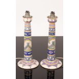 A pair of Carter Stabler Adams Poole Pottery candlesticks,