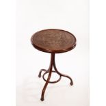 A Jacob & Josef Kohn bentwood occasional table with circular top on a tripod base, label under, 52.