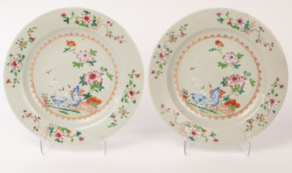 A pair of Chinese famille rose porcelain plates, Qianlong, decorated with peonies, cranes,