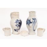 Two London Delftware tavern measures, circa 1790-1820, baluster shape with grooved necks,