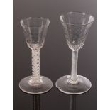 Two 18th Century wine glasses, each with hammered bowls, one with an incised twist stem,
