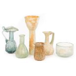 A selection of Roman glass, 1st-4th Century AD, all in pale green glass, comprising a small bowl, 5.