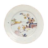 An English Delftware plate, probably Bristol, circa 1750-60, with a 'bianco sopra bianco' border,