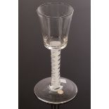 An 18th Century wine glass,