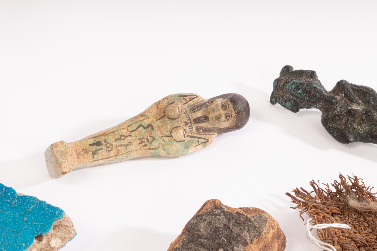 A selection of Egyptian and Egyptian style antiquities, comprising a bronze figure of Osiris, - Image 3 of 6