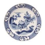 A Chinese saucer dish, Kangxi, circa 1720, painted with a 'Mongolian Hunting Scene',