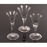 Three 18th Century wine glasses with tear included stems,