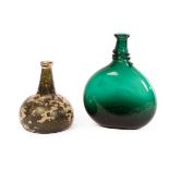 An 'onion' wine bottle, early 18th Century, with trailed rim and kick-in base,