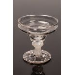 A pan-topped sweetmeat glass with pinched foot, opaque twist stem, 8.