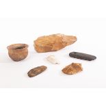 A collection of Neolithic tools, comprising a polished trapezoid axe head, probably Danish, 8.