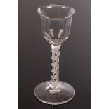 An 18th Century wine glass,