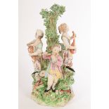 A large Derby figure group of musicians about a tree, incised no 199B,
