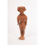A Roman terracotta figure of a lady, 2nd-3rd Century AD, full length,