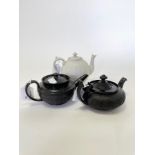 Three 19th Century Staffordshire small teapots and covers, one turned basalt,