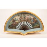 A painted fan depicting a bucolic scene with tortoiseshell sticks and a lace fan with tortoiseshell
