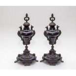 A pair black marble garniture urns, 19th Century, spelter finial and mounts decorated with phoenix,