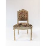 A 19th Century cream painted hardwood chair upholstered in Jacobean style crewel work