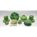 A group of four Italian vegetable form tureens, a set of six lettuce bowls and plates, onion model,