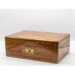 A George IV Goncalo Alves gentleman's dressing case, rectangular brass bound and inlaid,